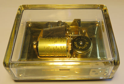 Large Reuge Sainte Croix cylinder music box in an elegant glass display case, Magic Flute with bells