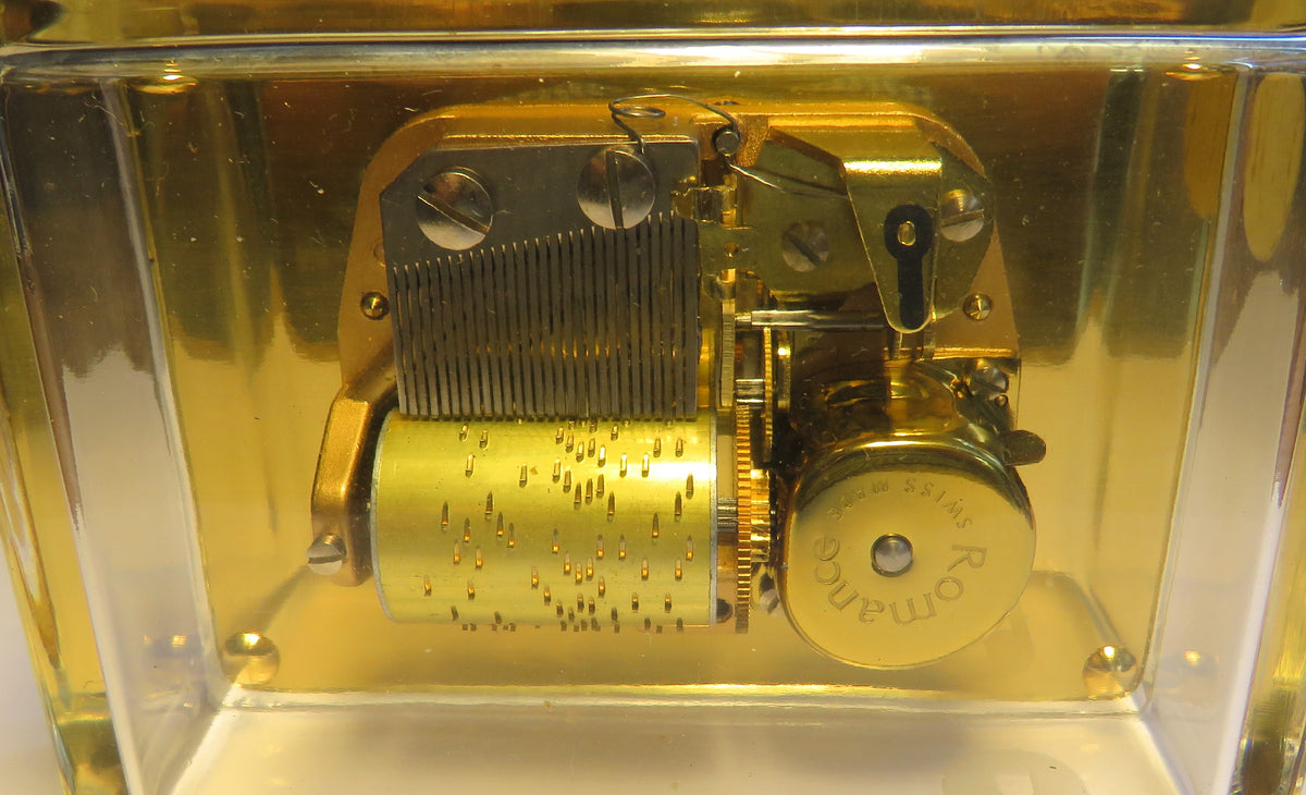 Large Reuge Sainte Croix cylinder music box in an elegant glass display case, Magic Flute with bells