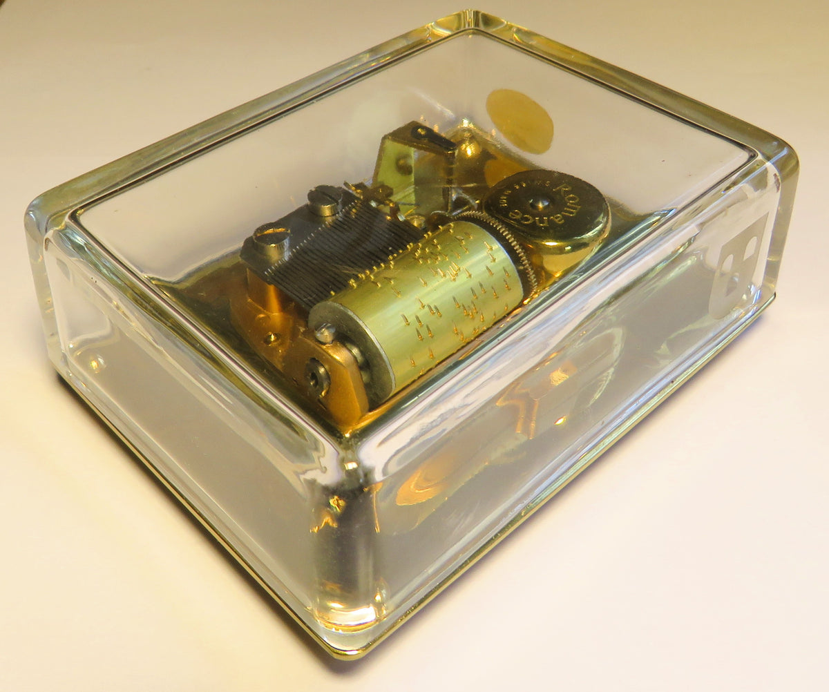Large Reuge Sainte Croix cylinder music box in an elegant glass display case, Magic Flute with bells