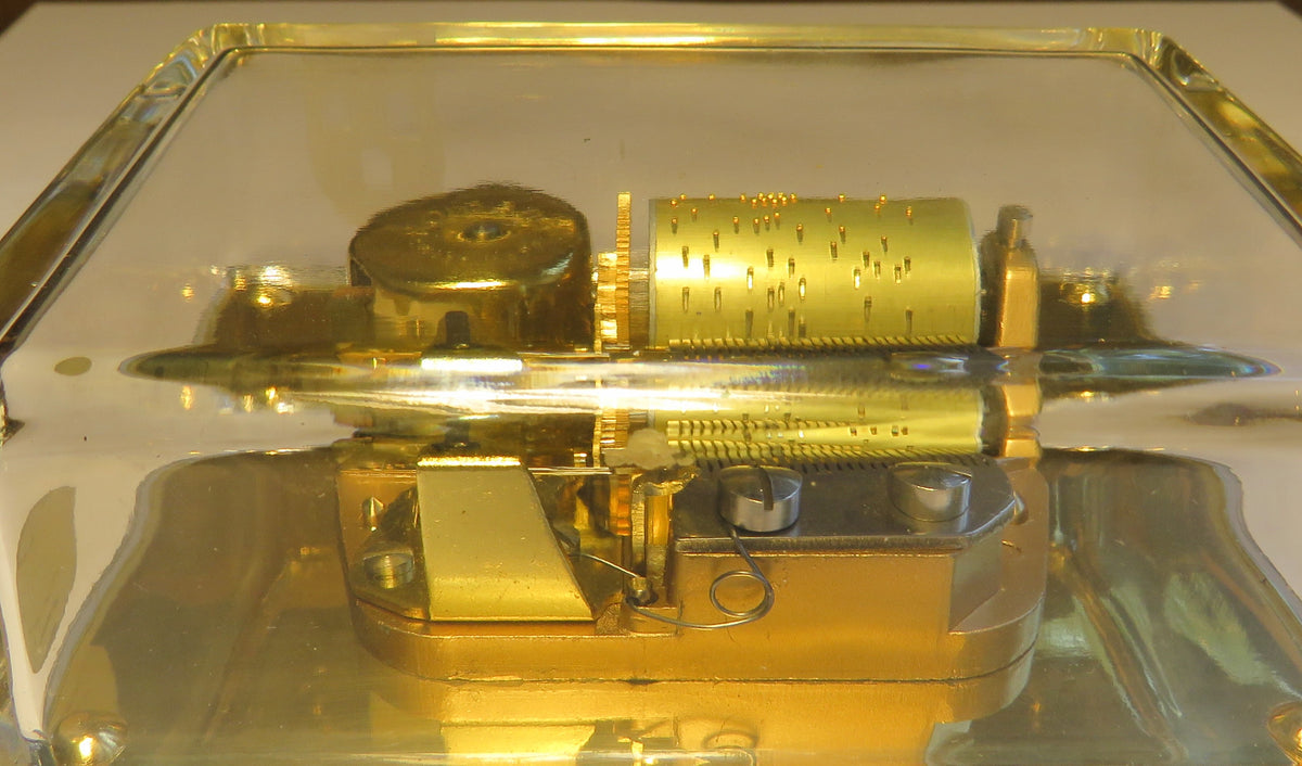 Large Reuge Sainte Croix cylinder music box in an elegant glass display case, Magic Flute with bells